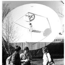 Caption reads: "Students Tony Raetz, left, Chris Johnson, and Tammy Davis are accustomed to the giant satellite dish on the Chico campus."