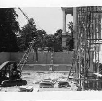 Exterior view of the California State Capitol Annex under construction. This view is looking west from the southside of the annex at the entranceway to the garage