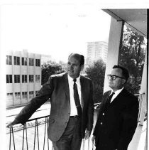 Walter R. Cecil and Joseph Murray on a balcony at Trinity House