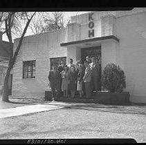 KOH Staff in front of building