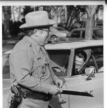 Governor Ronald Reagan films a PSA for the Office of Traffic Safety with Joe Higgins, veteran Hollywood character actor