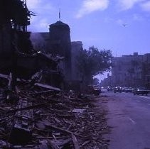 Views of redevelopment sites showing the demolition of buildings in the district. These views date from 1959 to 1964. Specific sites are not identified in this set of images