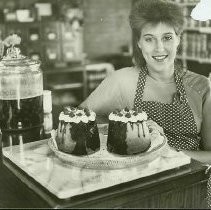 Woman with Gourmet Pastries