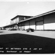 View shows the Southern Pacific Railroad's warehouses on Front Street