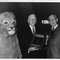 Walter "Duster" Mails, left-handed pitcher, holding an award