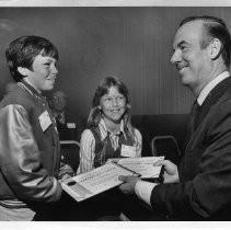 Michelle Keiler (center), receiving Certificate of Valor from California Attorney General Evelle Younger