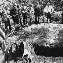 Reporters View Gravesite of Corona Victims