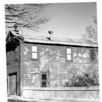 Side view of unidentified building, probably fire house, Columbia, CA