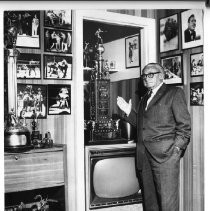 Ancil Hoffman, the former boxing manager and county supervisor, for whom Ancil Hoffman Park and Ancil Hoffman Golf Course are named, with photos and trophies