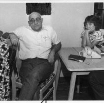 Robert Hohman, center, and Lew Hohman, right, await word of U.S. hostage Donald Hohman (son of Robert and brother of Lew). Sgt Hohman (an Army medic), was from West Sacramento. Woman and child in photo are not identified. Iranian Hostage Crisis