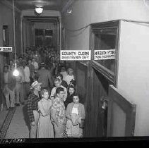9/11/52 - Voters register in court house for Nov. 4th election