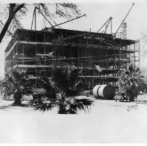 Exterior view of the State Library and Courts Building under construction showing it nearly completed by 1926