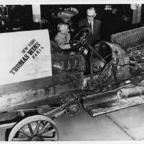 William Harrah (right) and George Schuster check Thomas Flyer on arrival in Reno, Nevada, following acquisition by Harrah's Automobile Collection in 1964