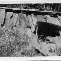 "Door into mens sweat house. Taken at Johnsons about twenty miles up the Klamath River."