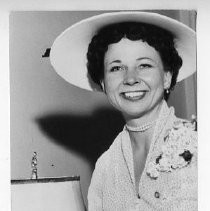 Virginia Carlson Knight, probably after her wedding to Goodwin Knight, Governor of California from 1953-1959; she is holding a bouquet and wearing a corsage