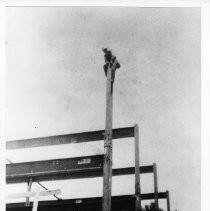 Dave Chavez atop a building under construction