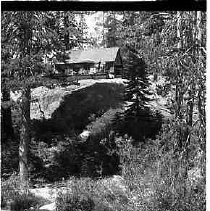 A cabin next to a river