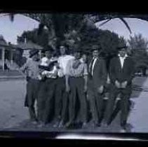 Finx Baseball Team standing under a palm tree