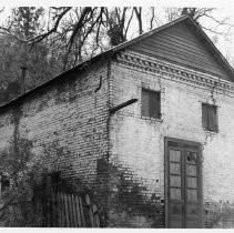 1850s building in Fiddletown with brick-covered stone walls