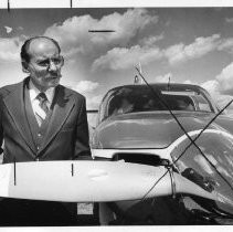 Bob Hoover. Caption: "...winged career." He is shown with a small private airplane