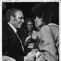 Benjamin Hooks, the American Civil Rights leader, is greeted by well-wishers. Hooks, a minister and attorney, served as the executive director of the NAACP from 1977-1992