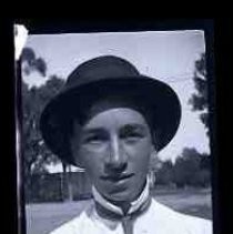 A young man wearing a hat