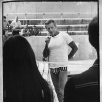 Buster Crabbe famous for his film roles as Tarzan and Flash Gordon. He earned a gold medal in swimming in the 1932 Olympic Games. Here he addresses the crowd at Cosumnes River College