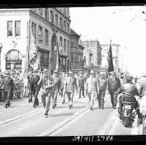 Fraternal group of men marching in a parade