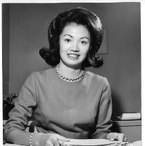 Josie Leong, at her desk at work, after being chosen Queen of the Chinese Moon Festival