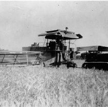 "Caterpillar Tractor Pulling Holt Grain Harvester"