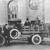 Capital National Bank building with truck and armed guards