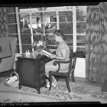 A woman sitting at a desk