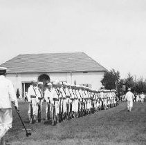 Soldiers march at a fair
