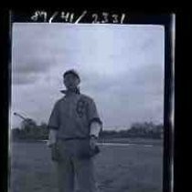 Man wearing baseball uniform