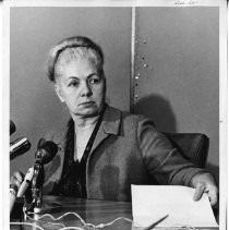 Dr. Irene Hickman, an osteopath and the new Sacramento County assessor, seated at a microphone