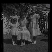 Portrait of a four girls in a backyard