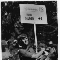 Bob Gilder. Caption reads, "Pro Bob Gilder's facial expression matches the score on the board as he finishes the Del Paso Country Club's course challenging."