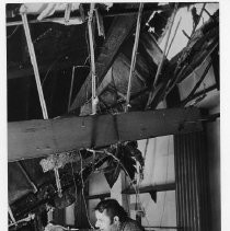 Nick Galaxidas looks over the damage from a fire at his restaurant, "Zorba the Greek"