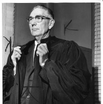 Municipal Judge Oscar A. Kistle, donning his robes