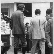 Kenneth Cory (Assembly) wearing high-top boots. Cory said he wore the boots to protest Governor Ronald Reagan's outdated way of running the state