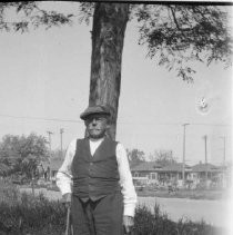 Man standing in front of tree