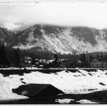 House in winter mountain setting