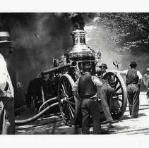 A horse drawn fire engine pumper