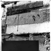 Section of exposed wallpaper from interior of old Ernst Wilson Co. candy shop adjacent to Forum Building