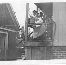 Family Seated on Porch