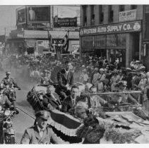 Charles Lindberg riding in a parade in his honor in Sacramento in 1927; Governor C.C. Young is also in the photograph