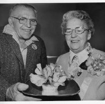 Mr. and Mrs. Herbert J. Litz of Sacramento, winners of the Outstanding Flower of the Show (likely the Camellia Flower Show)