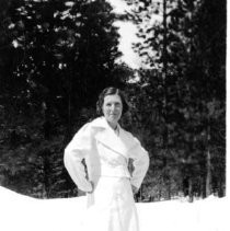 Woman standing on roadway