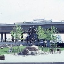 Old Sacramento. View of the Pony Express Statue site at 2nd and J Streets. View shows the site and installation of the statue. Crowd gathers during dedication