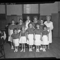 Ten girls dressed alike